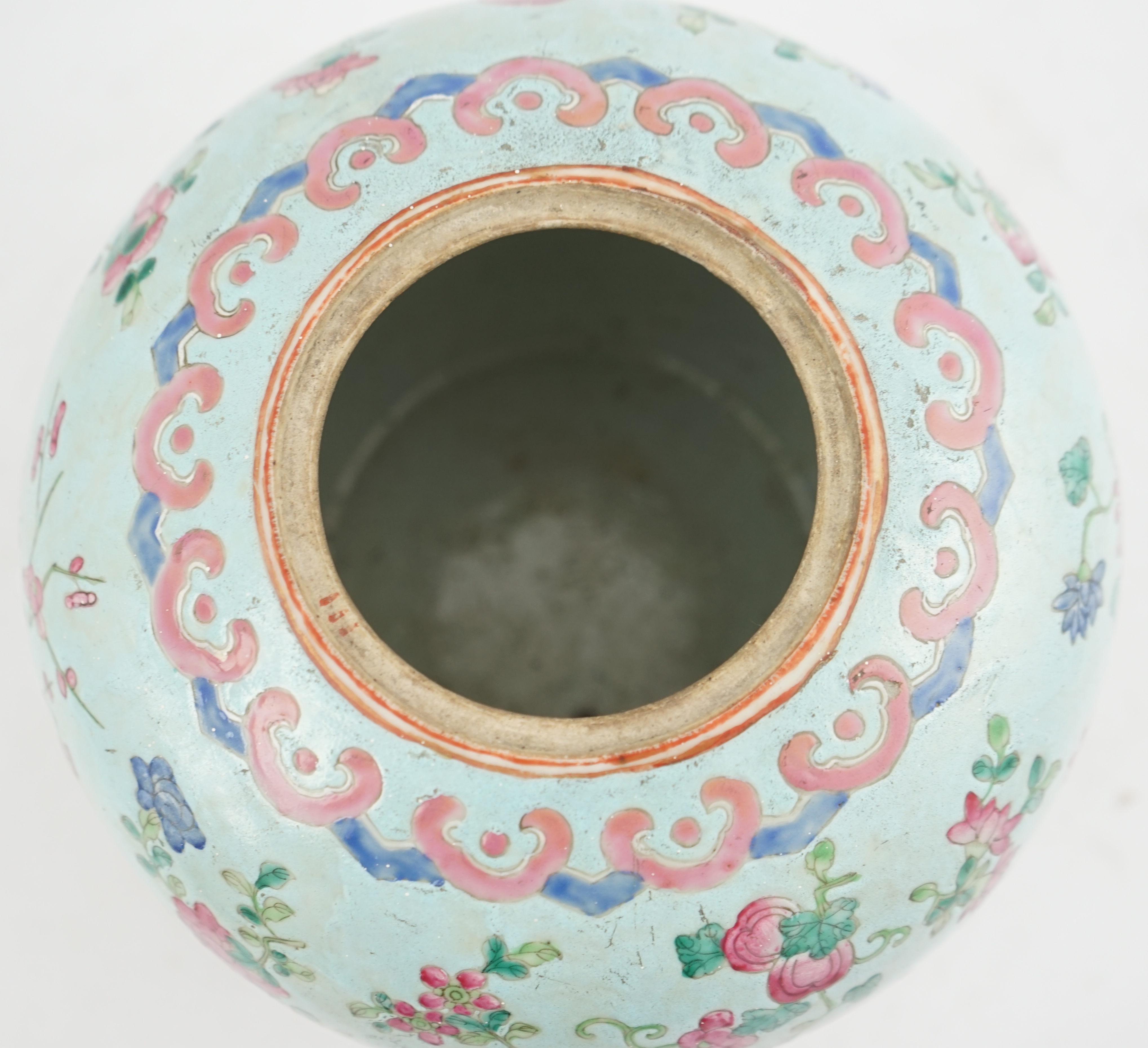 A Chinese turquoise ground famille rose jar and cover, late 19th century